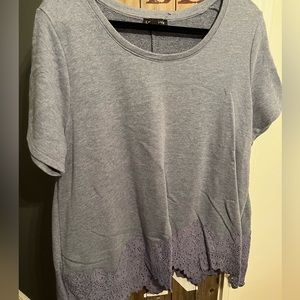 Lane Bryant top. Never worn. Embroidered bottom - see photo